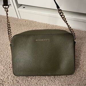 Michael Kors crossbody bag in army green with gold details.